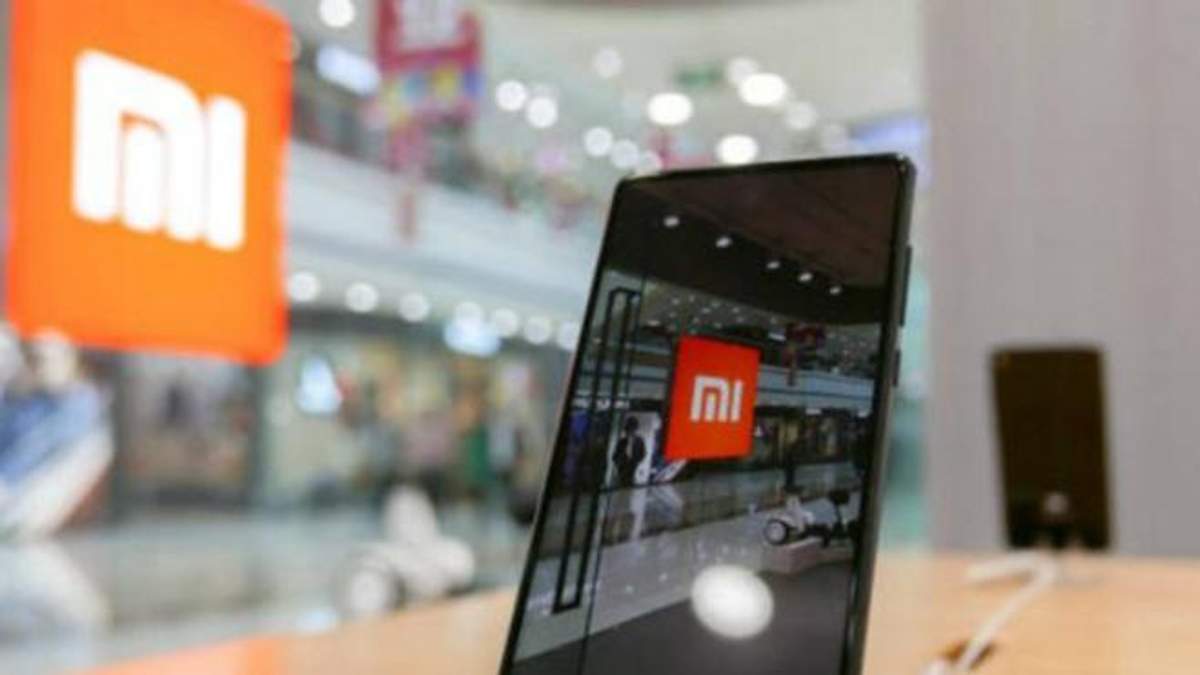 Смартфон Xiaomi Redmi 7 Pro "засветился" на фото Смартфон Xiaomi Redmi 7 Pro "засветился" на фото